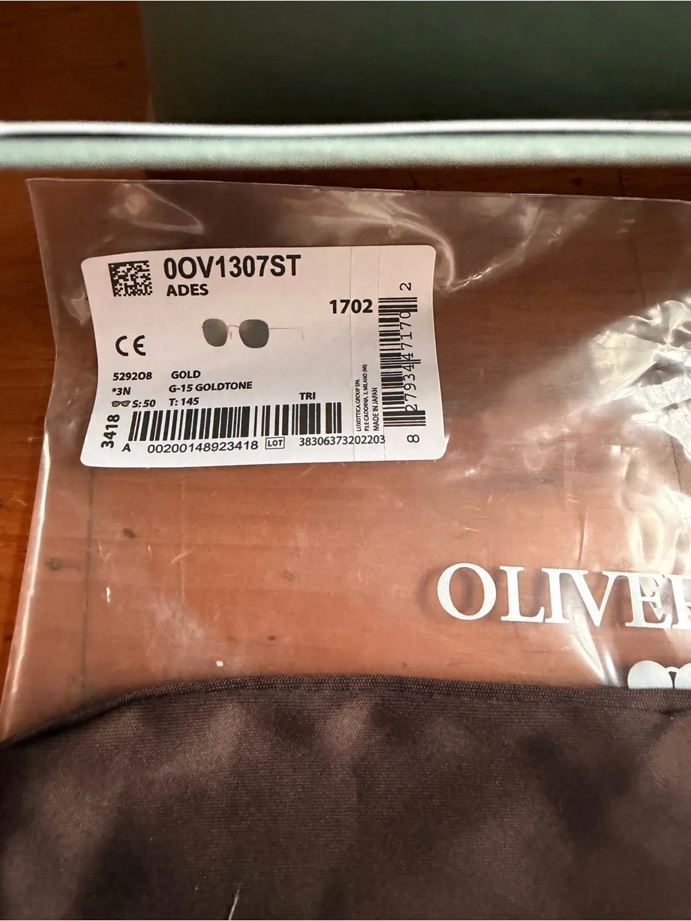 Oliver Peoples Adès Sunglasses OV1307ST Gold Titanium Frame Lenses G15 Goldtone
